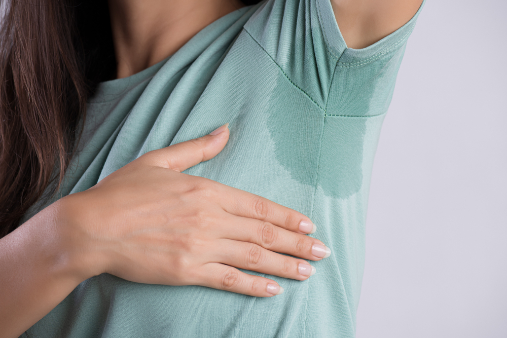 Close-up,Asian,Woman,With,Hyperhidrosis,Sweating.,Young,Asia,Woman,With