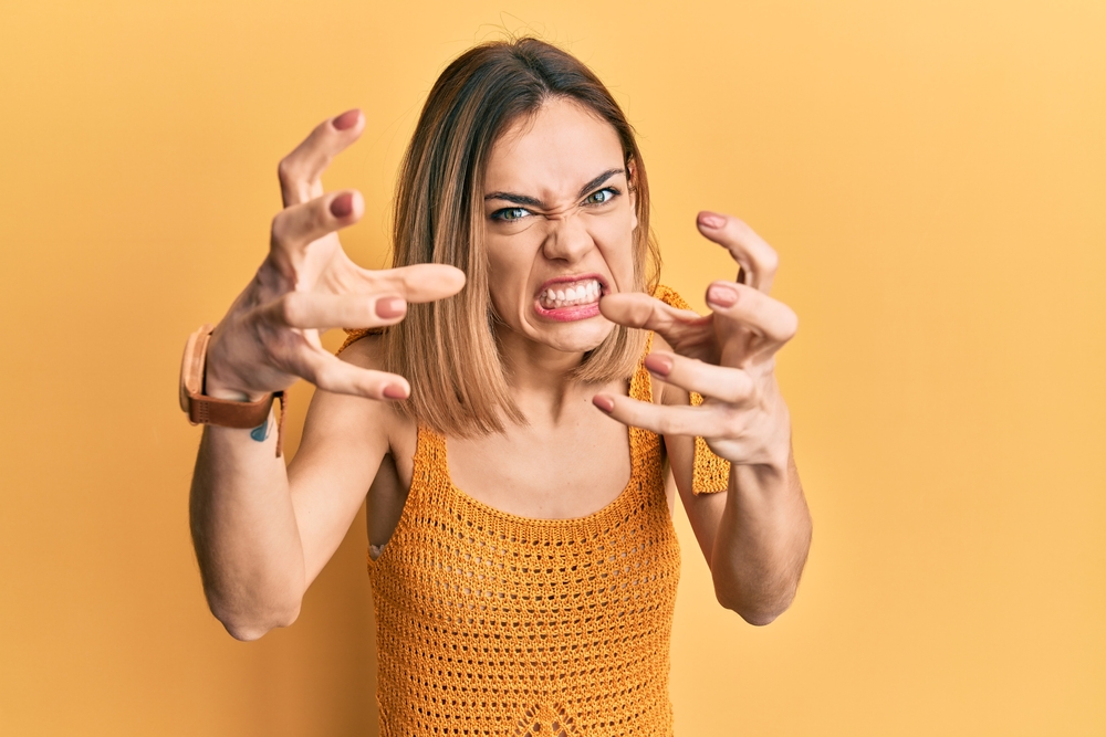 Young,Caucasian,Blonde,Woman,Wearing,Casual,Yellow,T,Shirt,Shouting