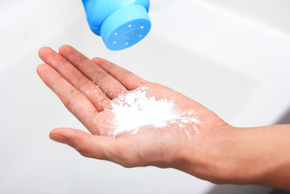 Applying,Talcum,Powder,On,Hand