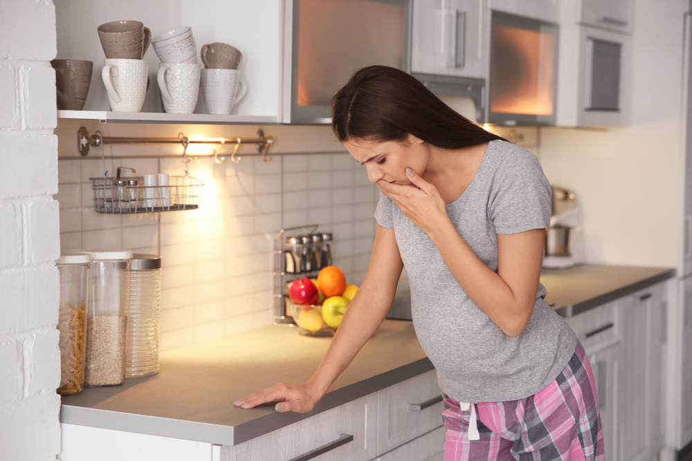 Young,Pregnant,Woman,Suffering,From,Toxicosis,At,Home