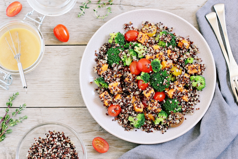 Quinoa,Salad,With,Broccoli,,Sweet,Potatoes,And,Tomatoes,On,A