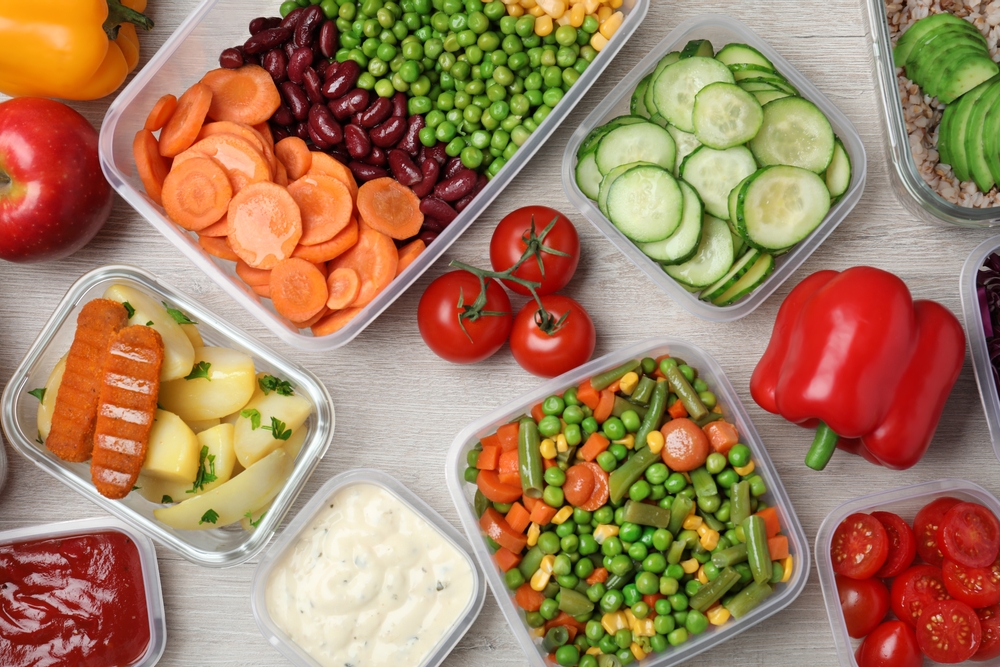 Set,Of,Containers,And,Fresh,Food,On,White,Wooden,Table,