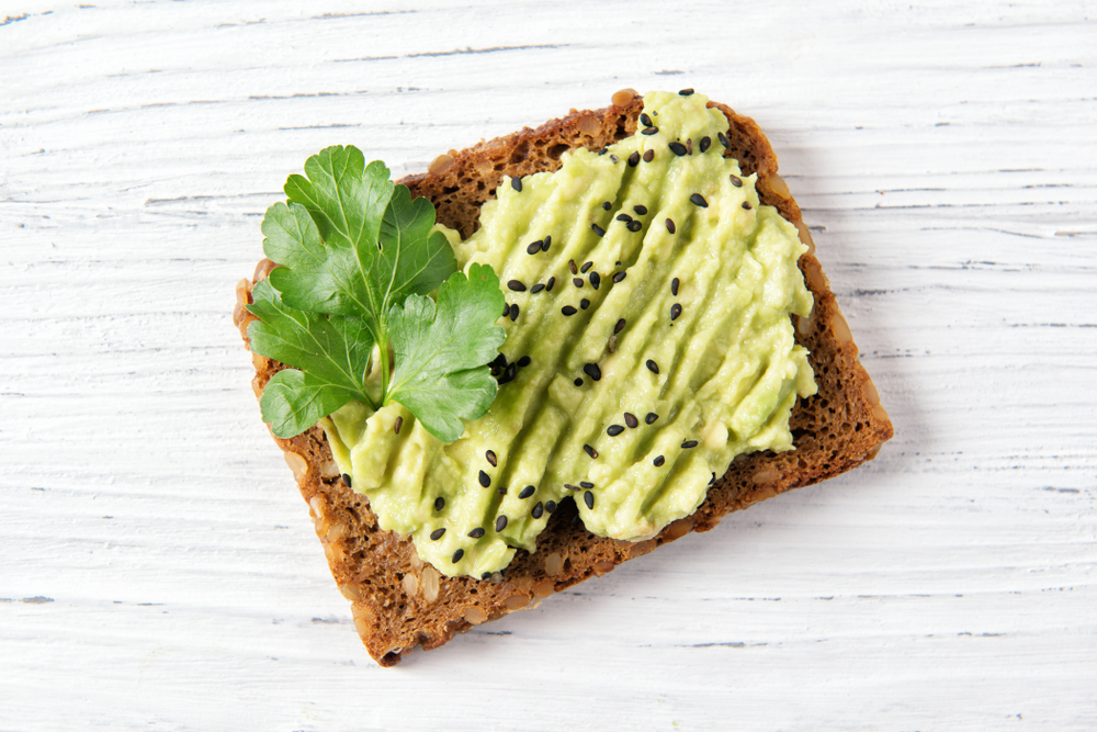 Avocado,Toast,On,Whole,Grain,Bread,,Mashed,Avocado,With,Sesame