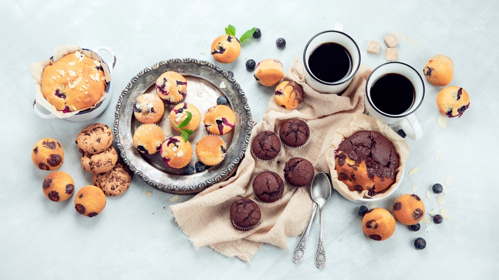 Muffins,Assortment,On,Light,Background.,Freshly,Baked,Cupcakes.,Celebration,Concept.