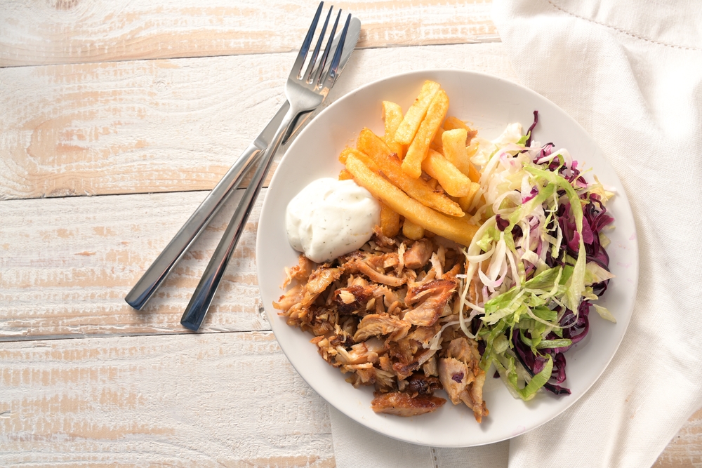 Doner,Kebab,Chicken,Meat,With,French,Fries,,Salad,And,Tzatziki