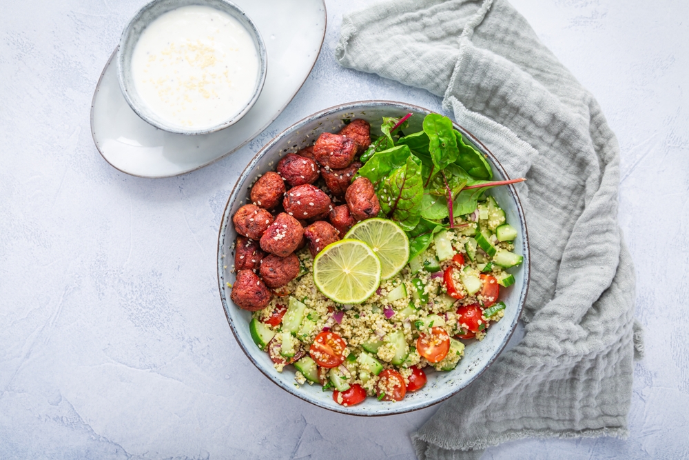 Buddha,Bowl,With,Beetroot,Falafel,Balls,And,Lemon,Yogurt,Dip.